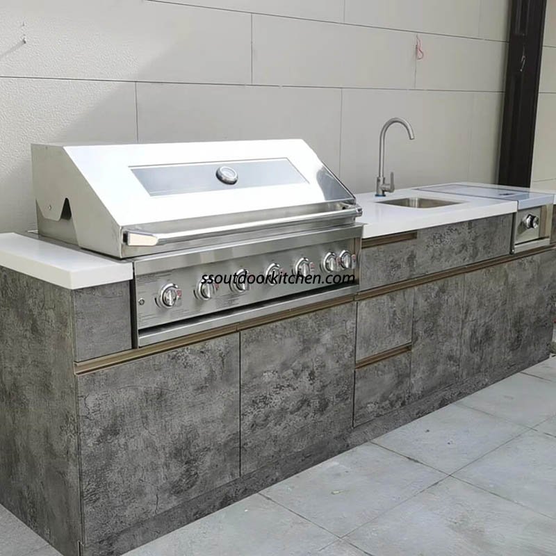 stainless steel outdoor kitchen with gas grill