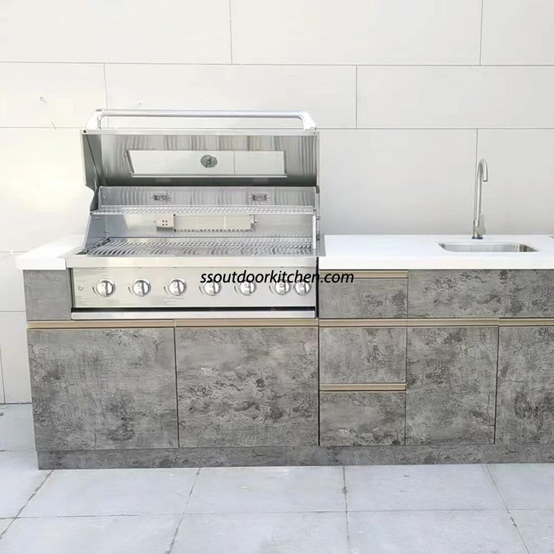 stainless steel outdoor kitchen with gas grill