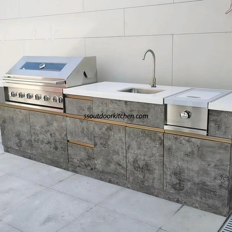 stainless steel outdoor kitchen with gas grill